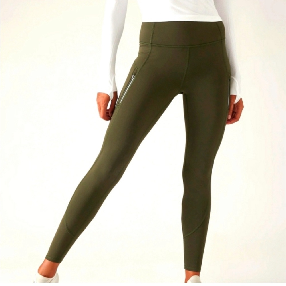 Athleta zip pocket 7/8 running tights. Army green. XS